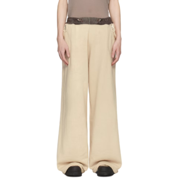 25 FW Charlie Constantinou 베이지 와이드 컷 스웨트팬츠 241785M190000